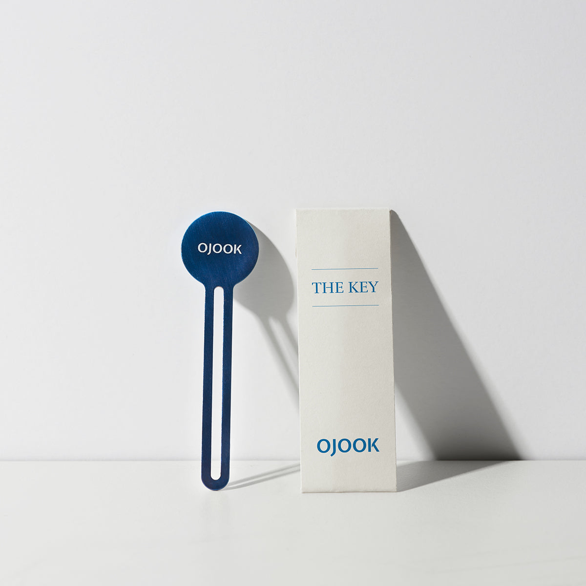 the key - a metal toothpaste squeezer